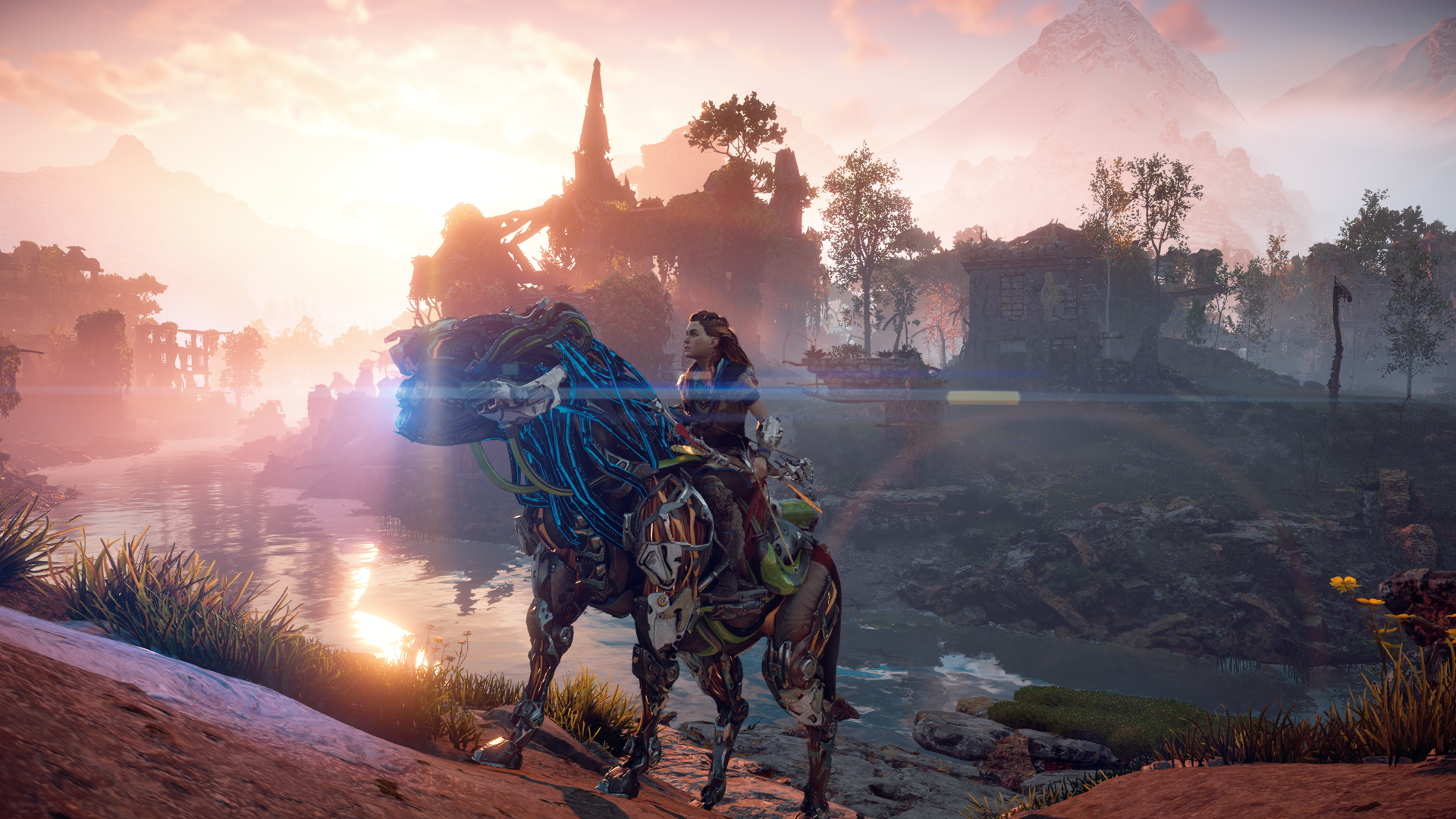 Aloy on a machine mount, as the sun rises on some ruins and a river.